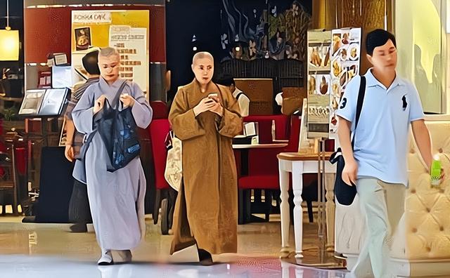 “黑丝尼姑”释智定:开豪车住别墅,私生活混乱,把寺庙当摇钱树